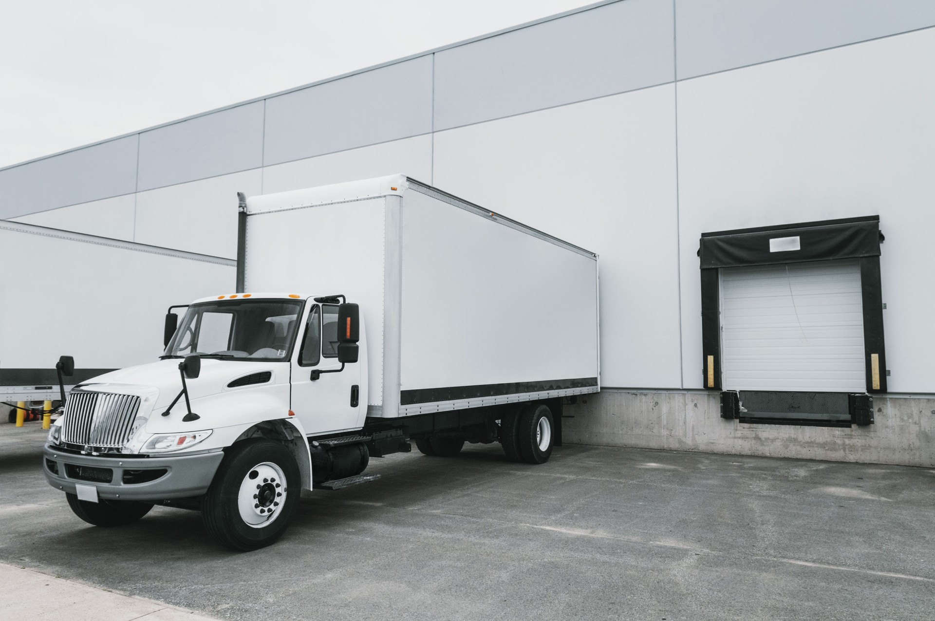 Delivery Trucks at Warehouse